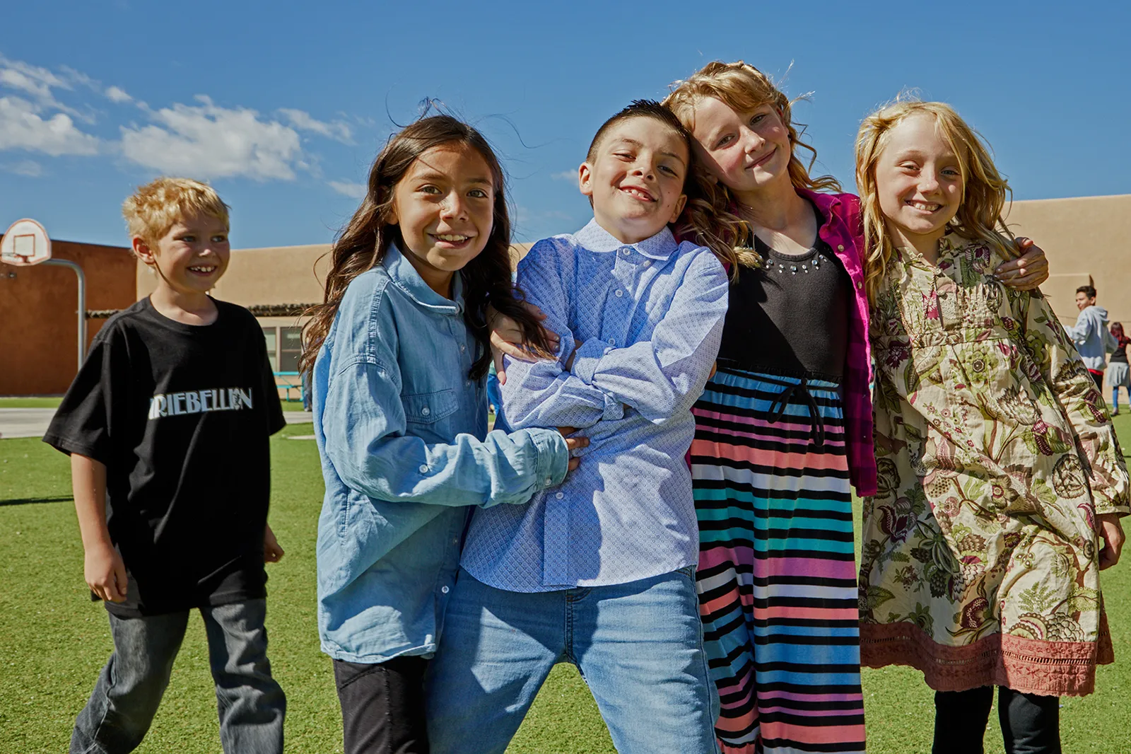 Children posing together smiling
