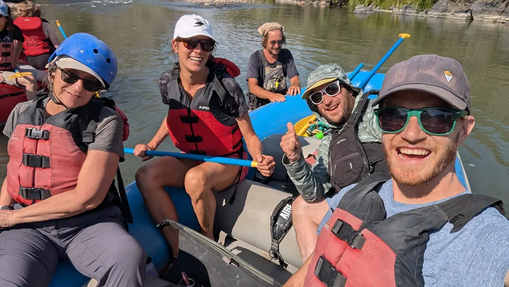Taos Academy Youth posing while kayaking